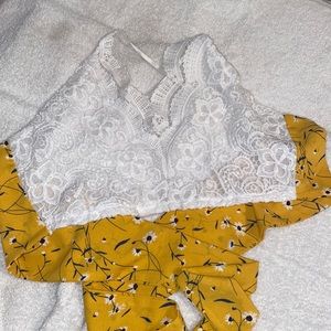 A strap up and ties in the back tank